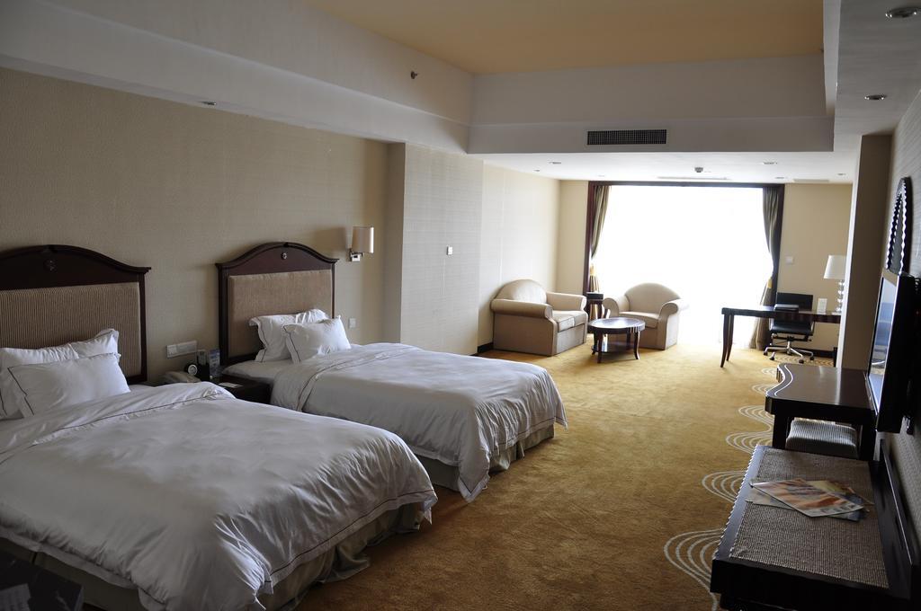 Country Garden Phoenix Hotel Хуаншань Номер фото